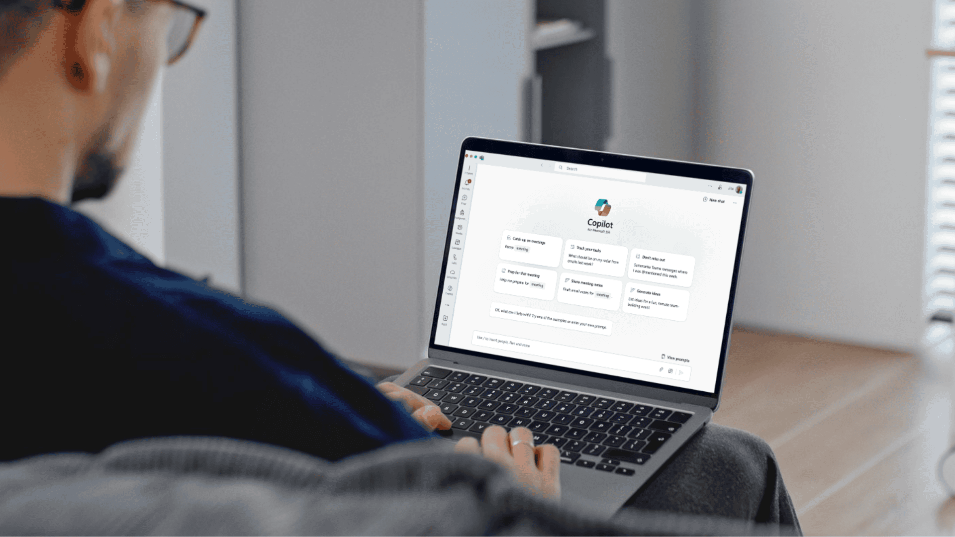 Person using copilot on a laptop
